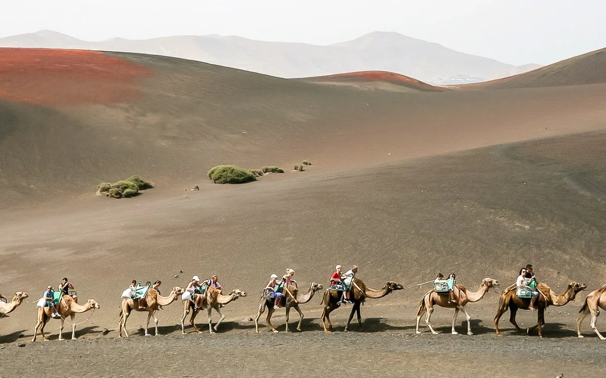 A coach on the crater road inside Timanfaya National Park on Lanzarote
